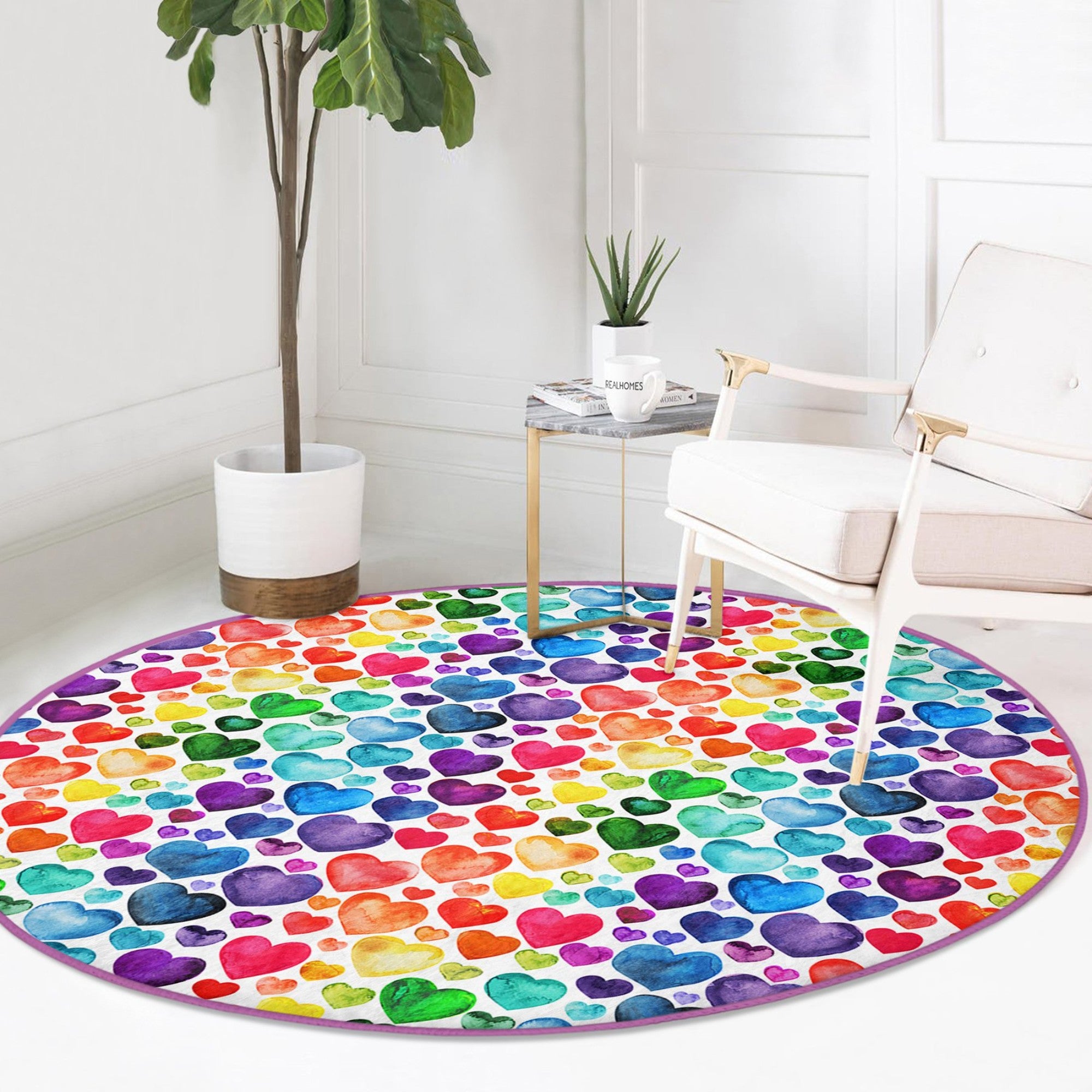 A colorful round rug featuring a vibrant rainbow heart pattern, perfect for home decor.