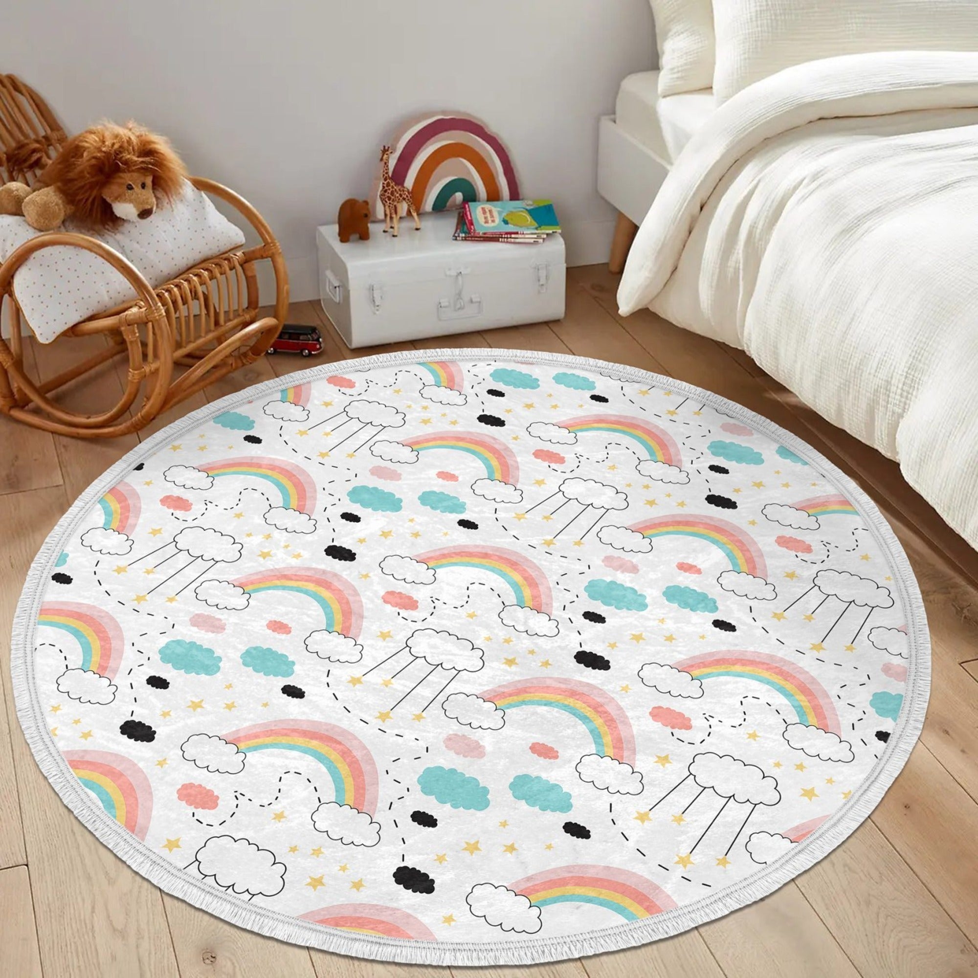 A colorful round nursery area rug featuring a vibrant rainbow pattern, designed for kids' rooms with a non-slip backing.