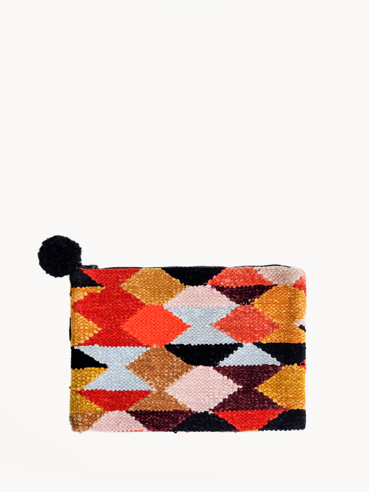 Rana Clutch made from recycled chenille fabric, featuring vibrant colors and unique patterns, perfect for fall and winter.