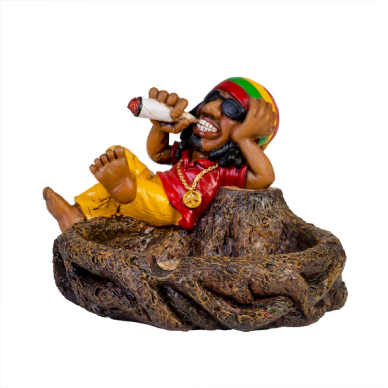 Colorful Rasta themed ashtray with tree stump design and cigarette notches.