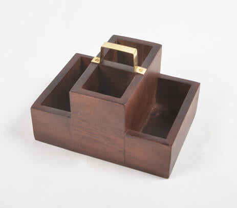 A handmade raw wooden desk organizer with four slots, showcasing unique textural variations and a natural finish, perfect for organizing stationery.