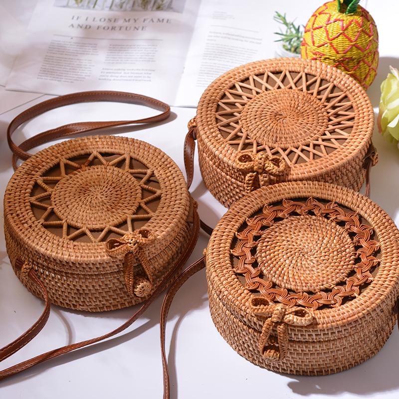 Realer Women Crossbody Bag, a stylish handmade round straw bag with floral pattern, perfect for summer outings.