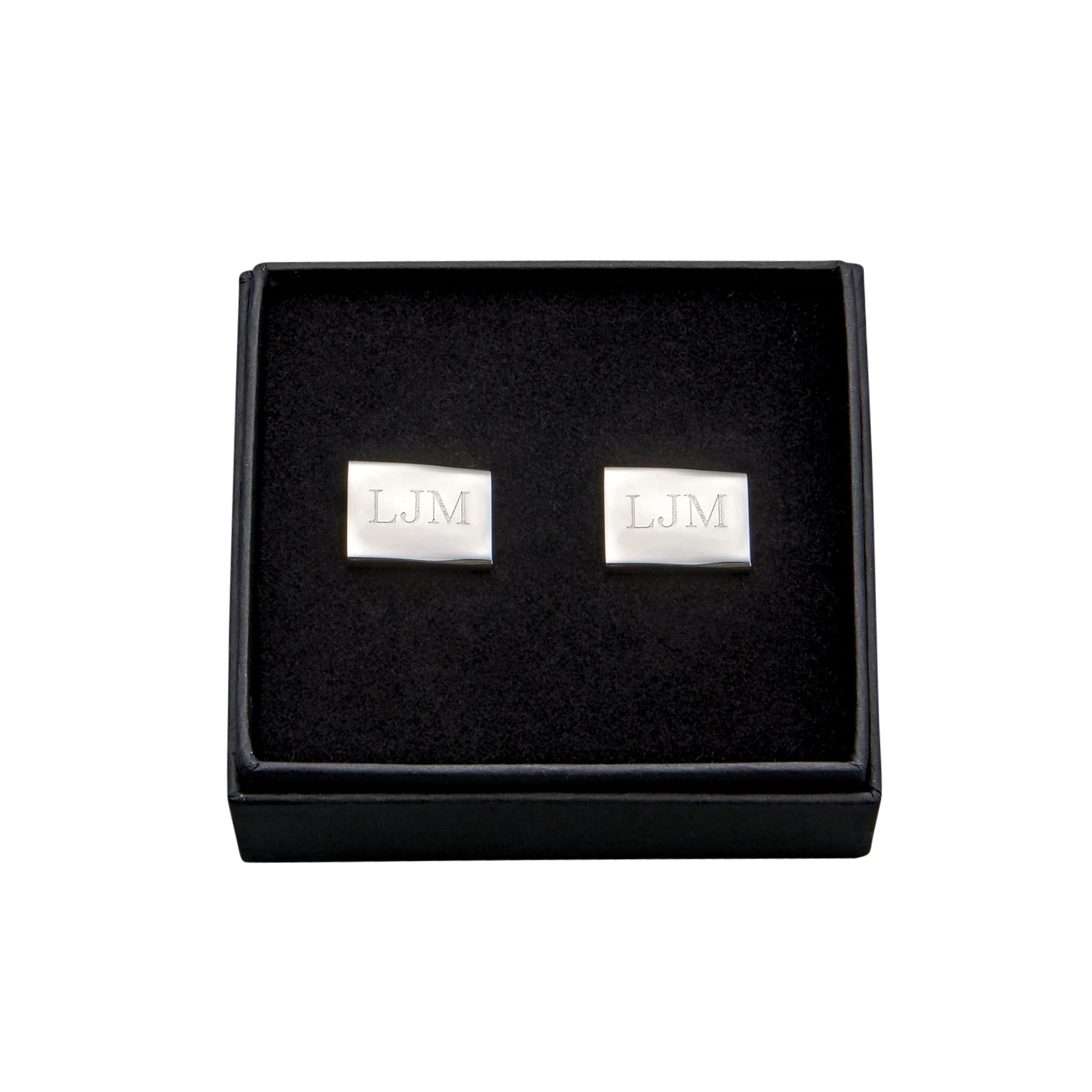 A pair of elegant rectangular cuff links with a palladium finish, displayed in a black gift box.