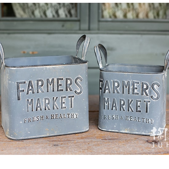 Rectangular gray flower pot made of iron, featuring a rustic design, perfect for decorative use in gardens or homes.