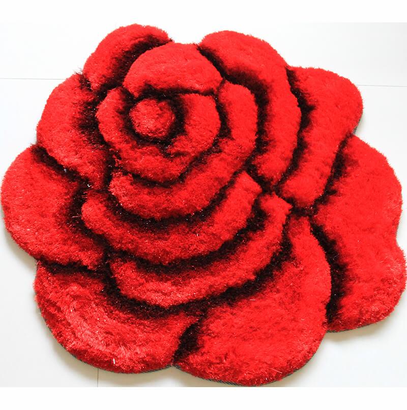 A plush red and black flower decorative rug with a shaggy texture, featuring a vibrant floral design, perfect for enhancing home decor.