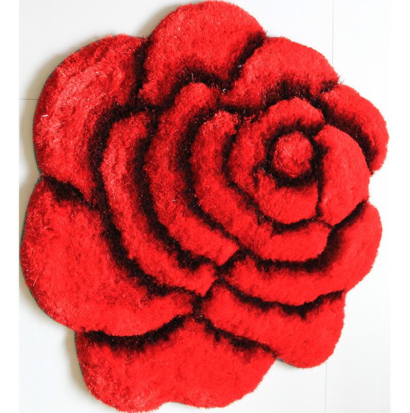 A plush red and black flower decorative rug with a shaggy texture, featuring a vibrant floral design, perfect for enhancing home decor.