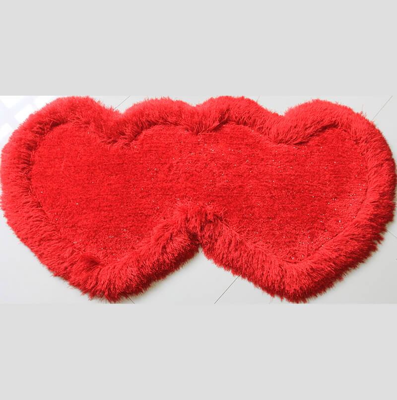 Red Double Heart Decorative Area Rug, soft shaggy texture, hand tufted, 28x55 inches, perfect for home decor.