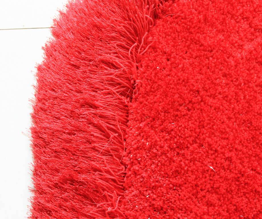 Red Double Heart Decorative Area Rug, soft shaggy texture, hand tufted, 28x55 inches, perfect for home decor.