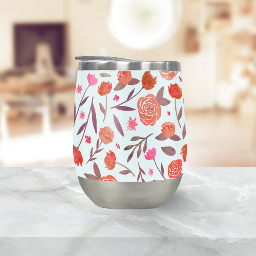 A stylish red floral wine tumbler made of stainless steel, featuring a double-wall design and a plastic lid, perfect for outdoor use.