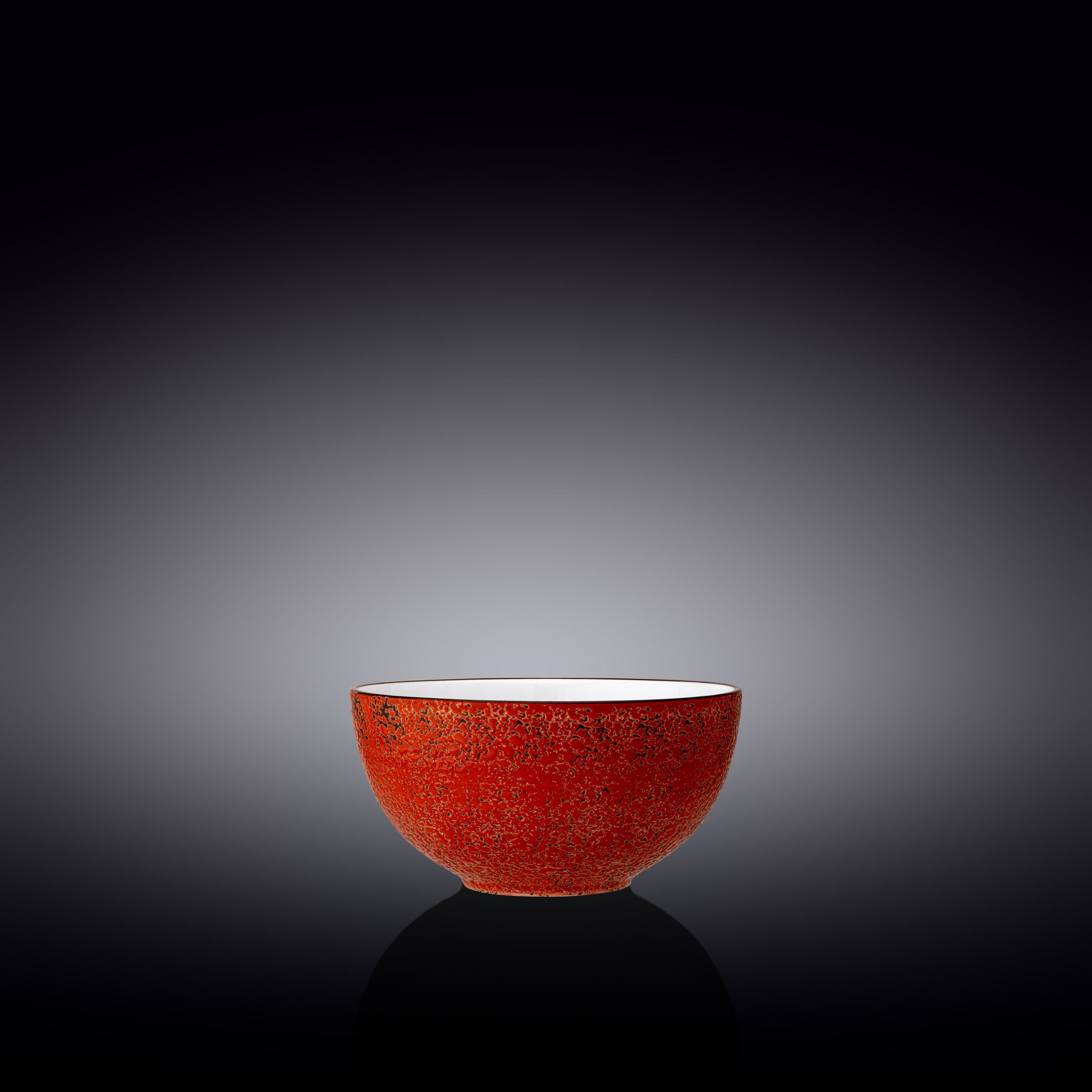 A vibrant red porcelain bowl, 4 inches in diameter, showcasing artisan-inspired design with colorful embellishments.