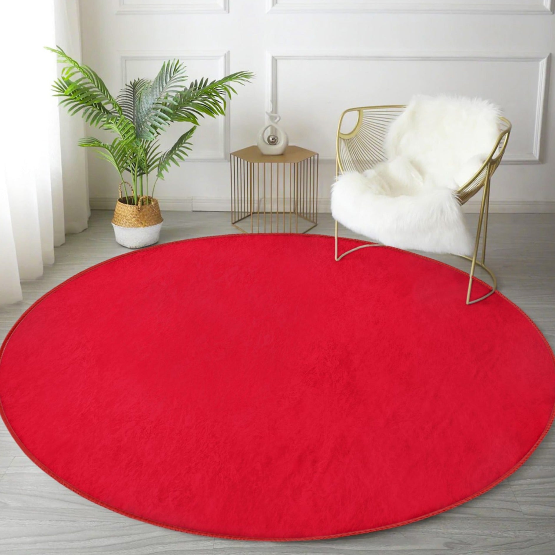 Red Washable Round Rug by Homeezone, featuring soft shiny velvet fabric and a vibrant red color, perfect for modern home decor.