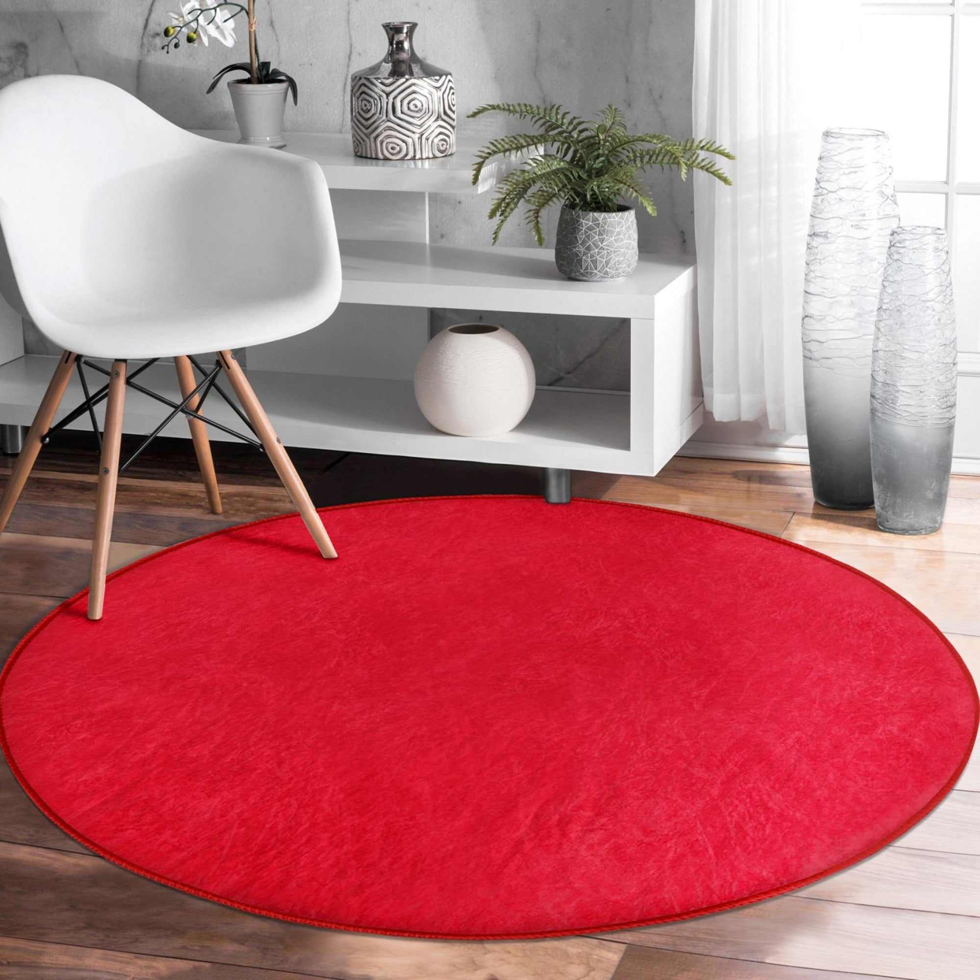 Red Washable Round Rug by Homeezone, featuring soft shiny velvet fabric and a vibrant red color, perfect for modern home decor.