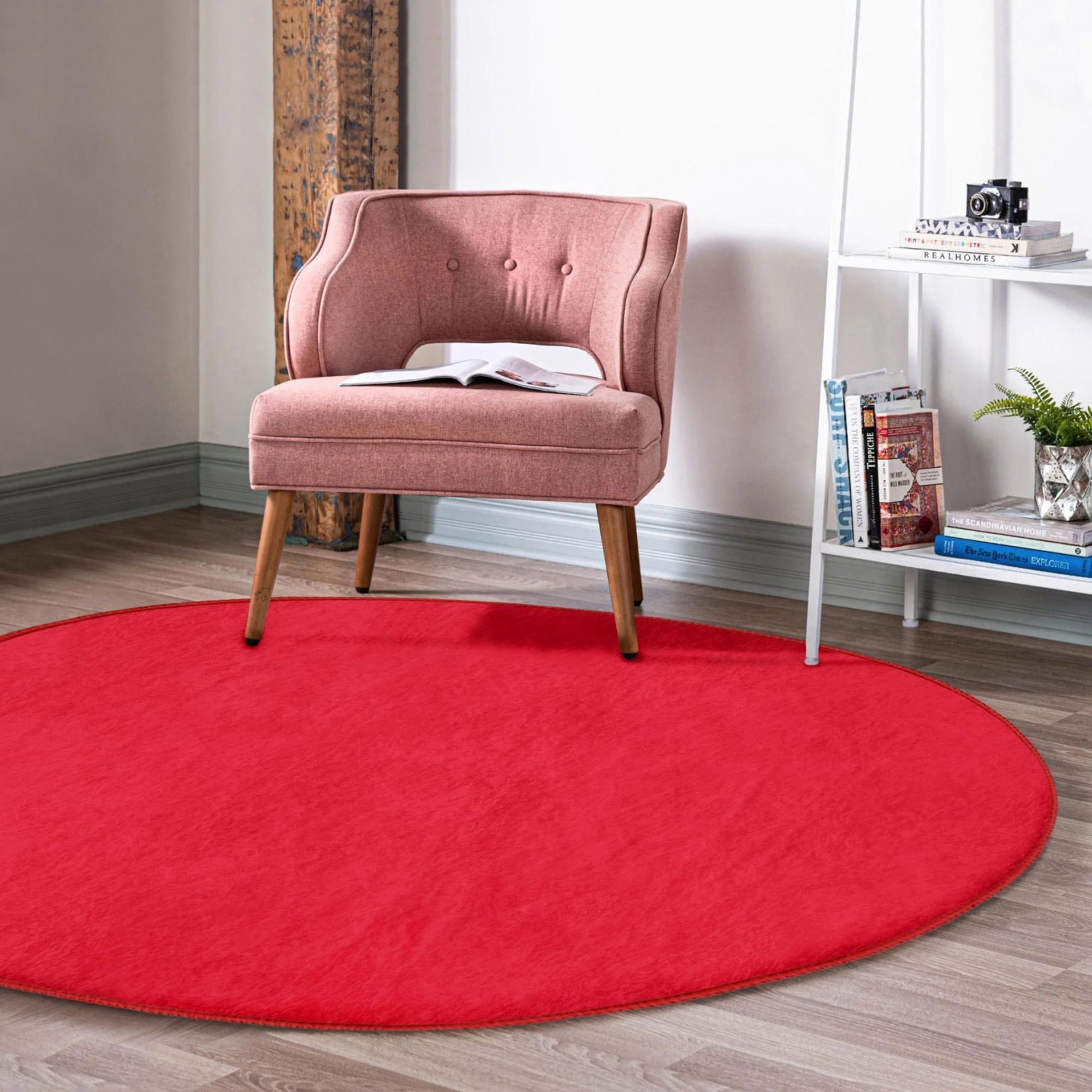 Red Washable Round Rug by Homeezone, featuring soft shiny velvet fabric and a vibrant red color, perfect for modern home decor.