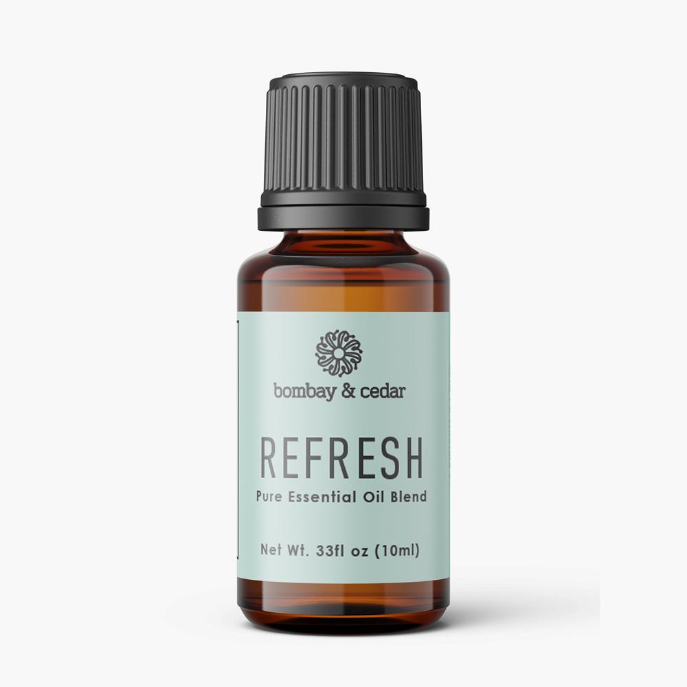 10ml bottle of Refresh Essential Oil Blend featuring a blend of Lemon Eucalyptus, Eucalyptus, Lavandin, Cypress, and Clove Leaf oils.