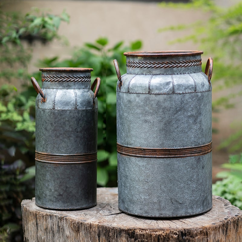 Restoration Flower Pot in gray-brown metal, showcasing its rustic design and durable construction, perfect for indoor and outdoor plants.