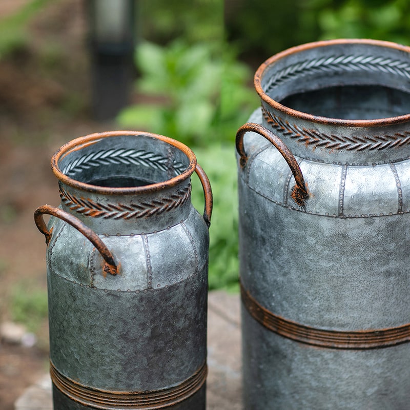 Restoration Flower Pot in gray-brown metal, showcasing its rustic design and durable construction, perfect for indoor and outdoor plants.