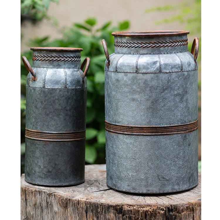 Restoration Flower Pot in gray-brown metal, showcasing its rustic design and durable construction, perfect for indoor and outdoor plants.