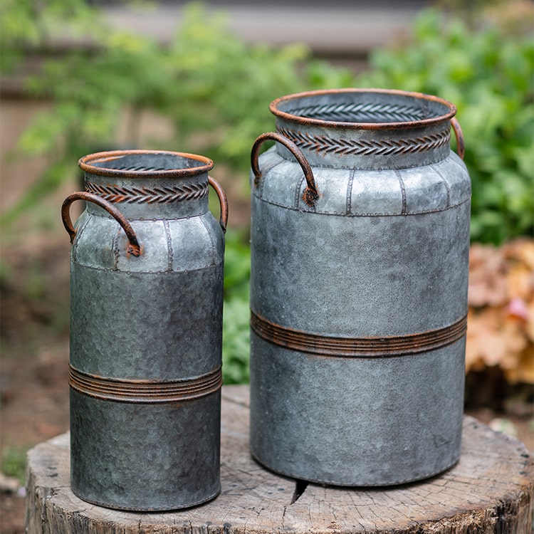 Restoration Flower Pot in gray-brown metal, showcasing its rustic design and durable construction, perfect for indoor and outdoor plants.