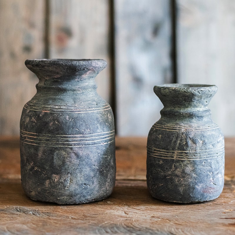 Restoration Style Concrete Vase in gray, showcasing its elegant design and sturdy construction, available in small and large sizes.