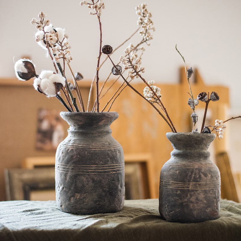 Restoration Style Concrete Vase in gray, showcasing its elegant design and sturdy construction, available in small and large sizes.