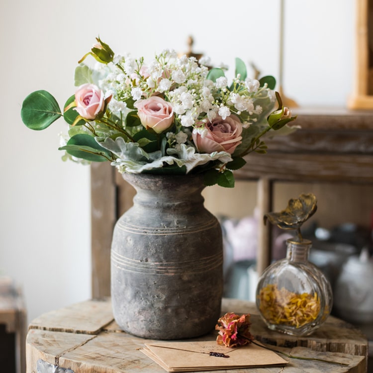 Restoration Style Concrete Vase in gray, showcasing its elegant design and sturdy construction, available in small and large sizes.