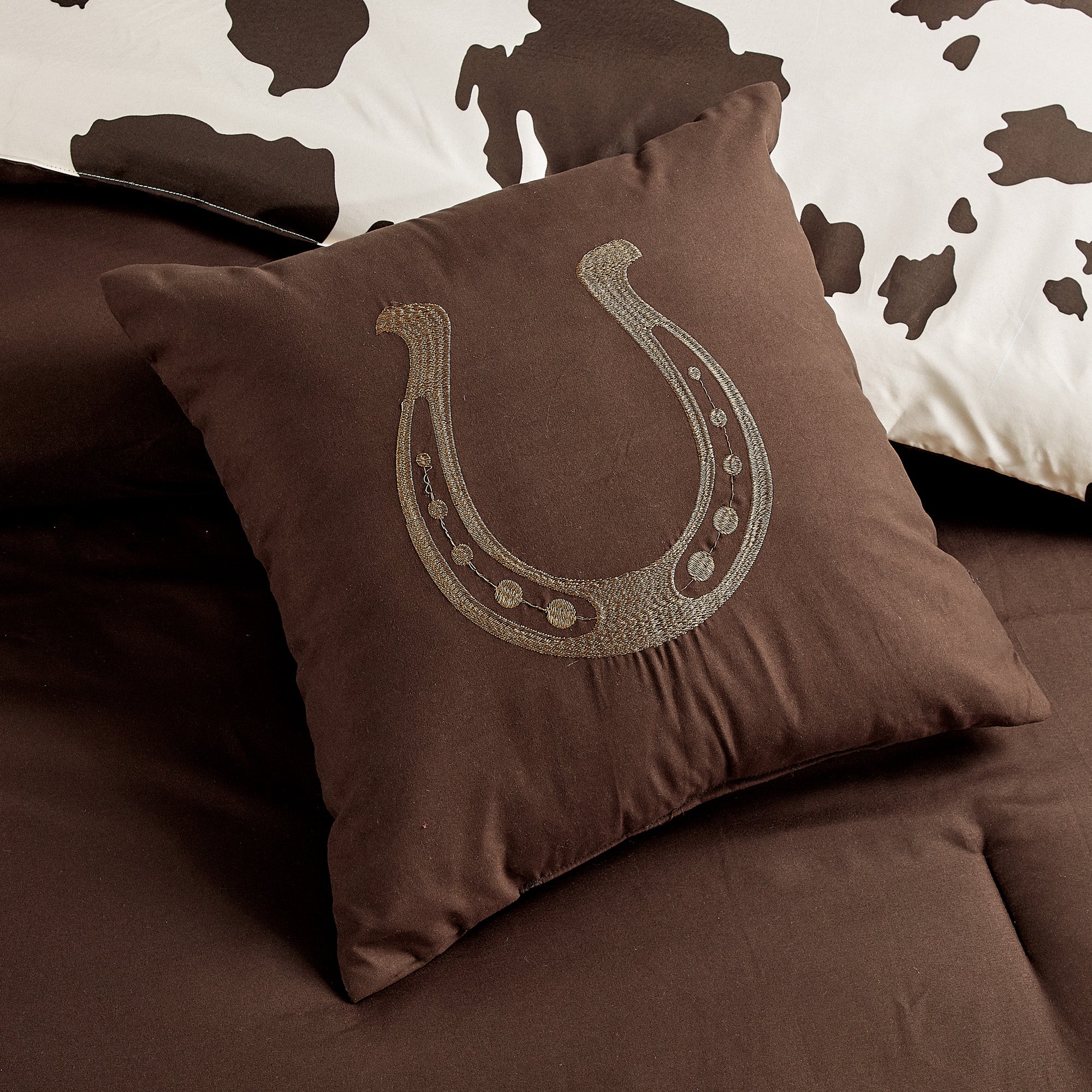 Reversible Cowhide Lovers Brown Horseshoe Comforter Set showcasing a luxurious design with creamy off-white and tawny brown colors, perfect for Western-themed decor.