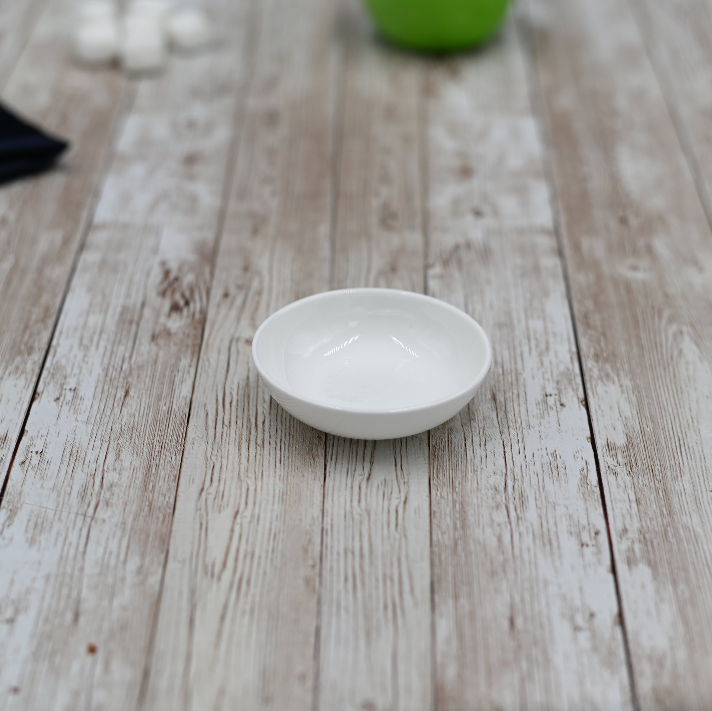 Round porcelain white soy dish, 3 inches in diameter, perfect for sauces and appetizers.