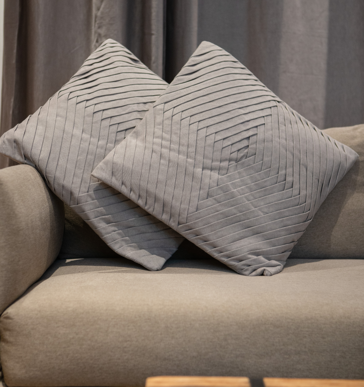 Royal Cushion Cover made from 100% organic cotton, featuring a luxurious pleated design in grey, perfect for home decor.