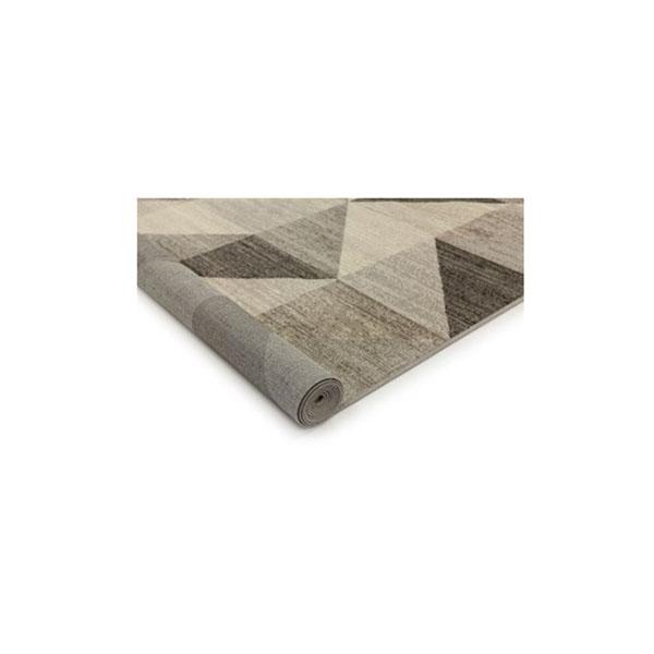 Geometric patterned rolled area rug.