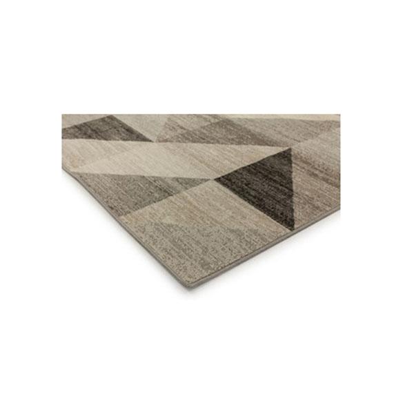 Geometric patterned gray area rug.