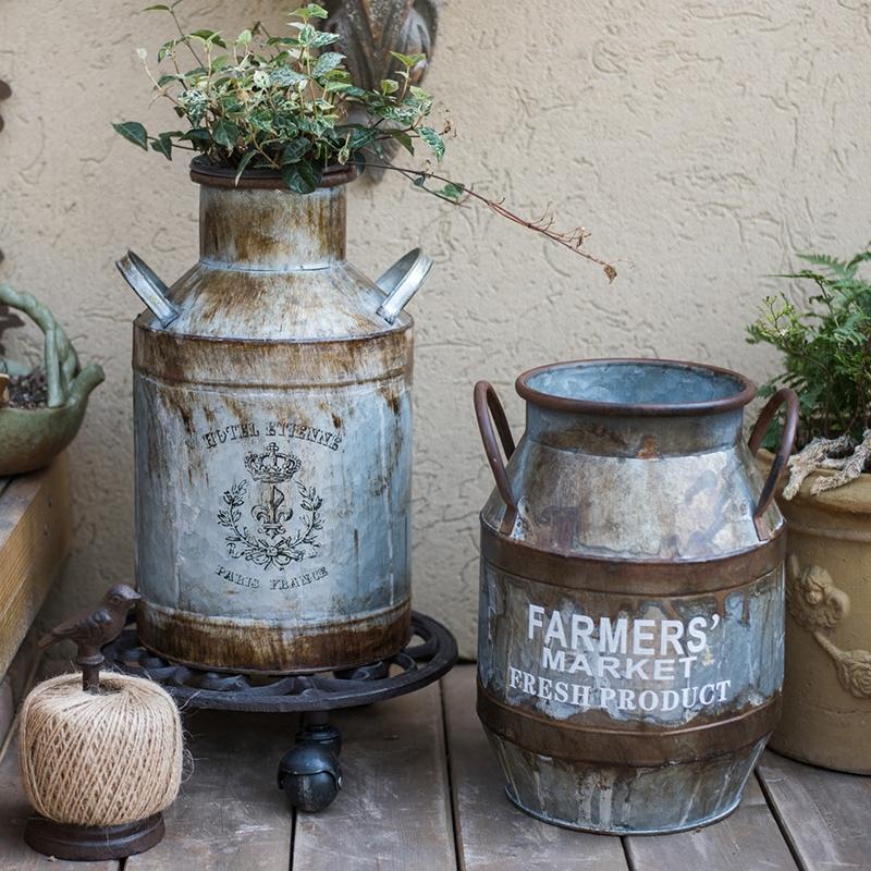 Rusty Metal Barrel flower pot with a vintage design, showcasing its gray and rusty color finish, perfect for indoor and outdoor use.