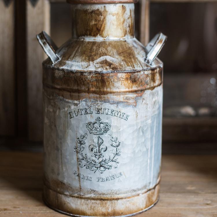 Rusty Metal Barrel flower pot with a vintage design, showcasing its gray and rusty color finish, perfect for indoor and outdoor use.