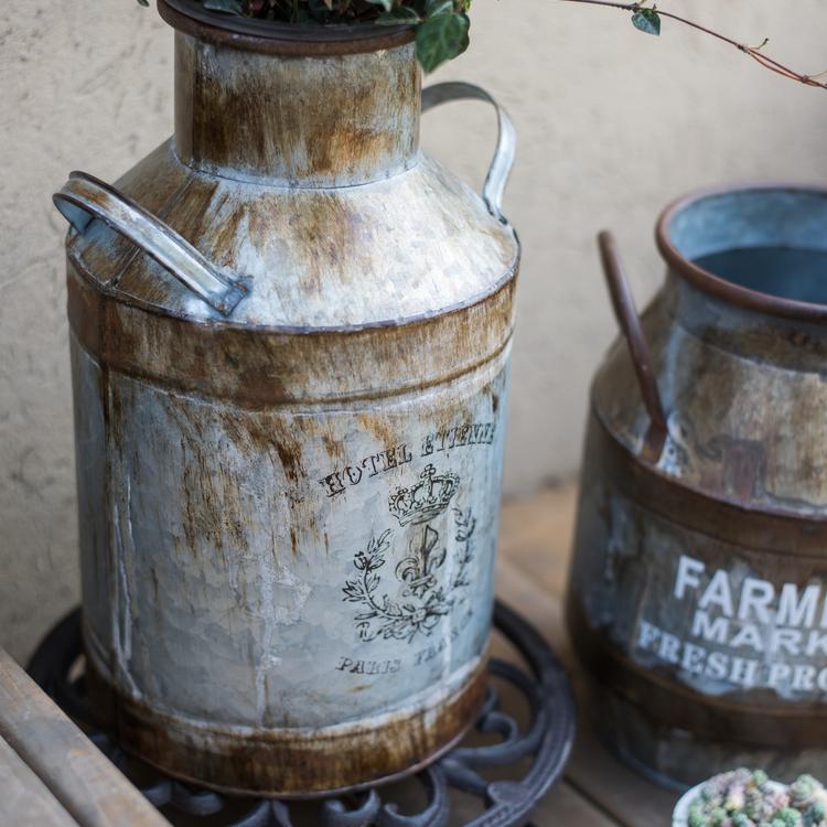 Rusty Metal Barrel flower pot with a vintage design, showcasing its gray and rusty color finish, perfect for indoor and outdoor use.