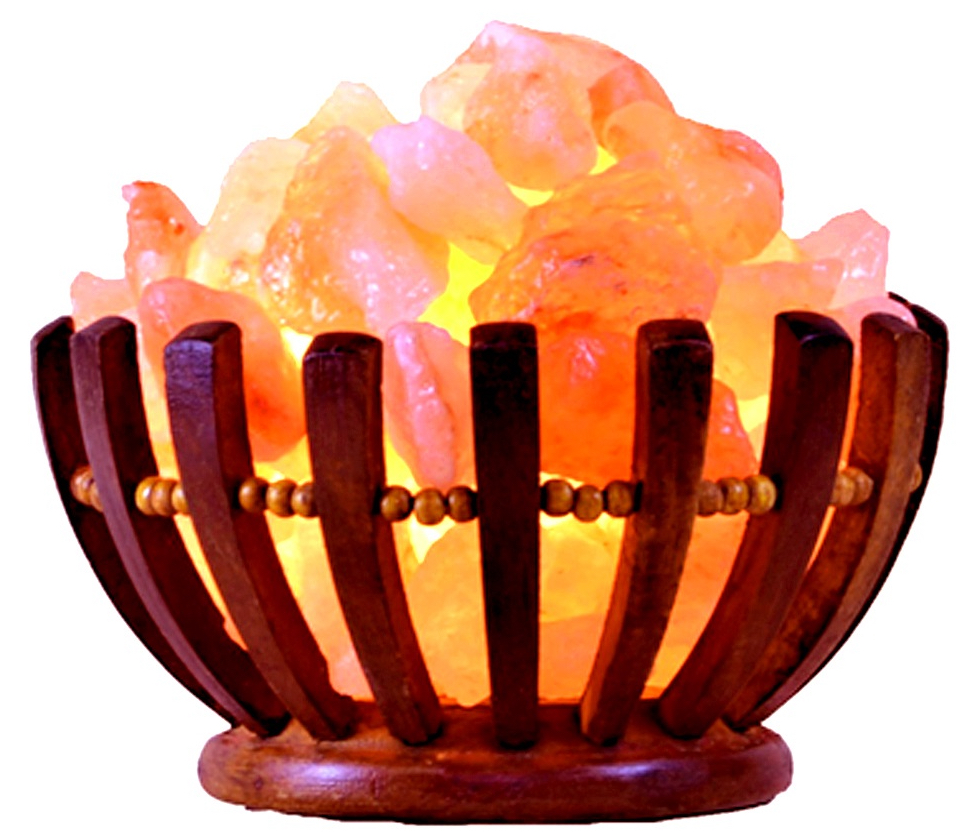 Himalayan salt lamp in a beautifully hand-carved rosewood basket, showcasing unique salt chunks and warm glow.