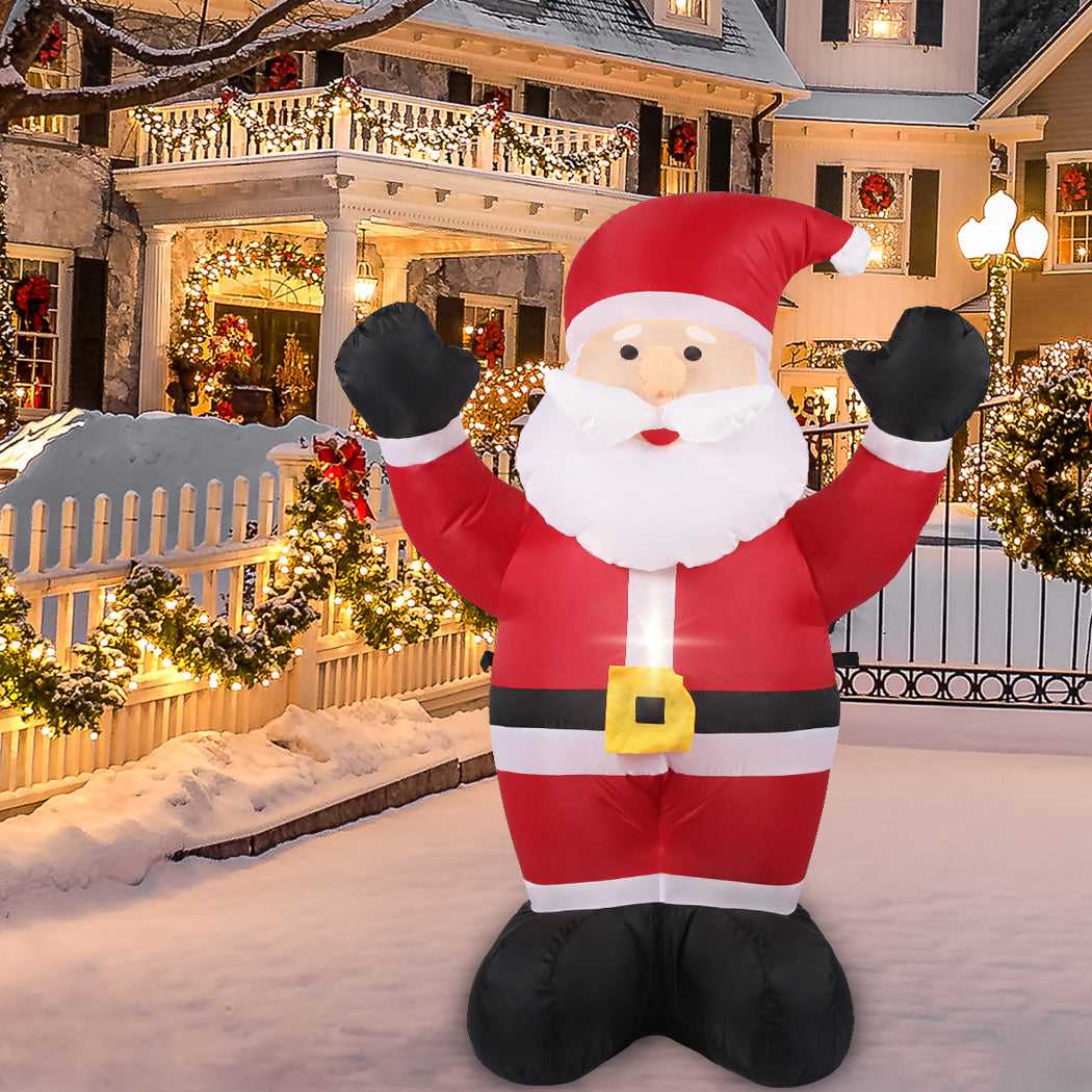 A cheerful inflatable Santa Claus decoration with LED lights, standing 1.2 meters tall, perfect for Christmas outdoor displays.