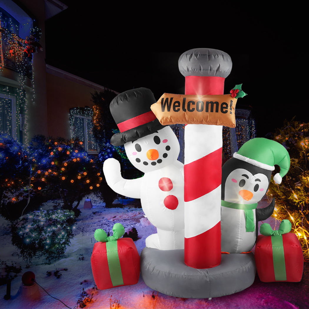 Santaco Inflatable Christmas Decor Pole with LED lights, standing 1.8M tall, showcasing a festive design perfect for outdoor holiday decoration.