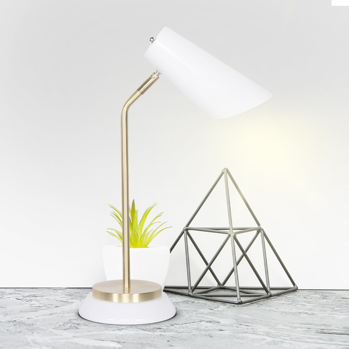 Sarantino Electric Reading Light Table Lamp with brass finish and unique laser-cut shade, perfect for modern and vintage decor.