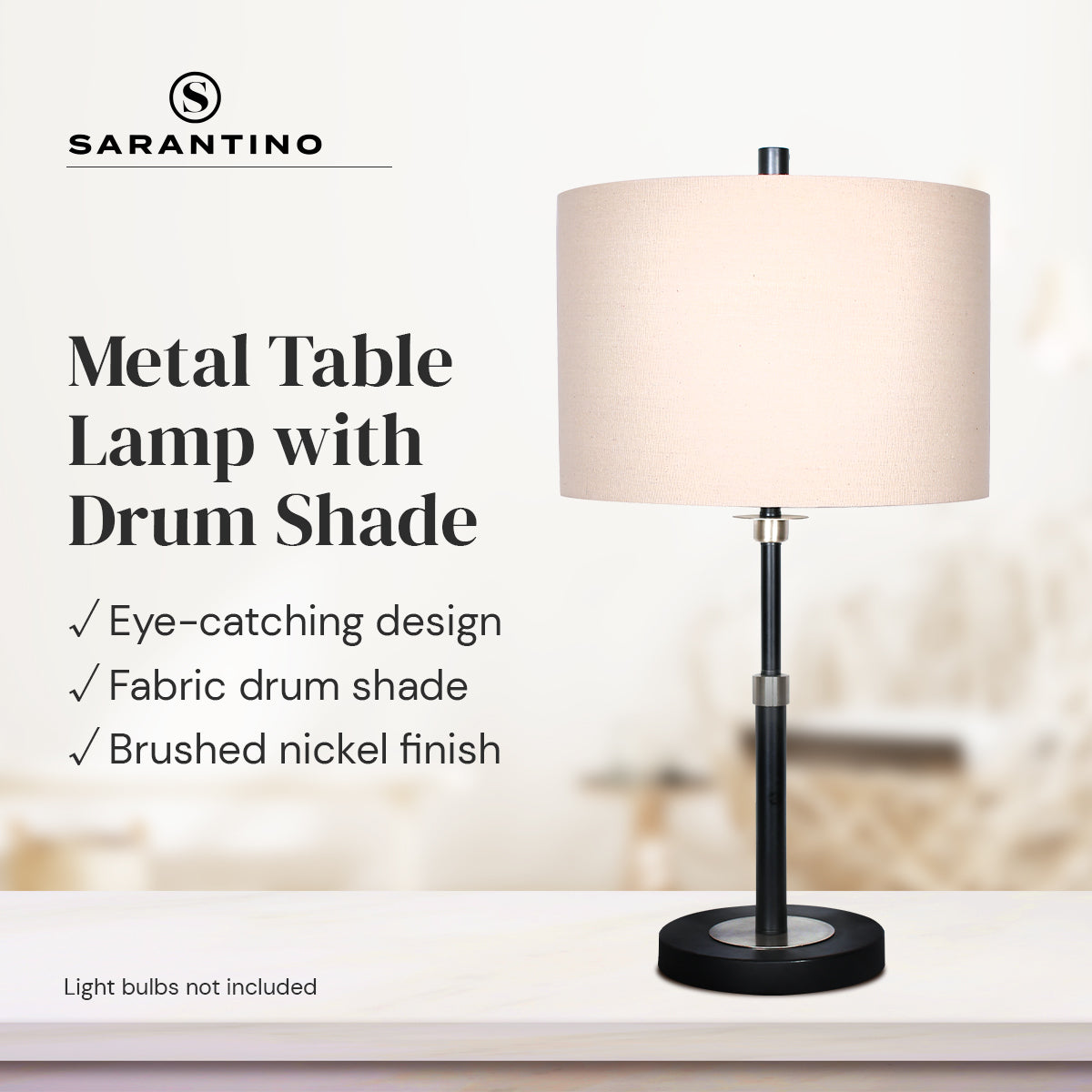 Sarantino Metal Table Lamp with a cream linen drum shade and black metal base, showcasing a modern and elegant design.