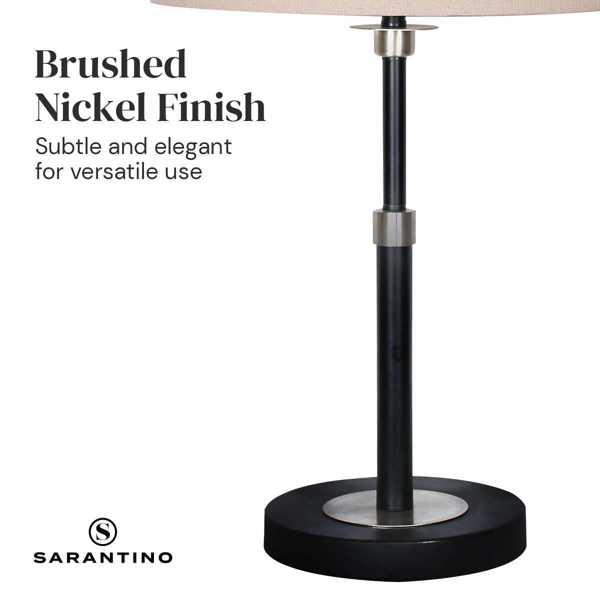 Sarantino Metal Table Lamp with a cream linen drum shade and black metal base, showcasing a modern and elegant design.