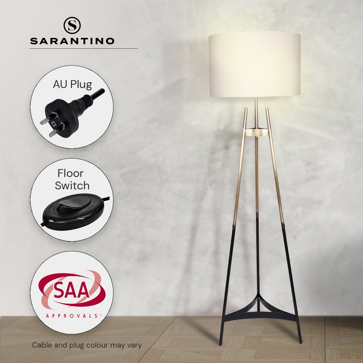 Sarantino Metal Tripod Electric Floor Lamp with gradient gold and black finish and neutral linen drum shade, elegantly designed for modern interiors.