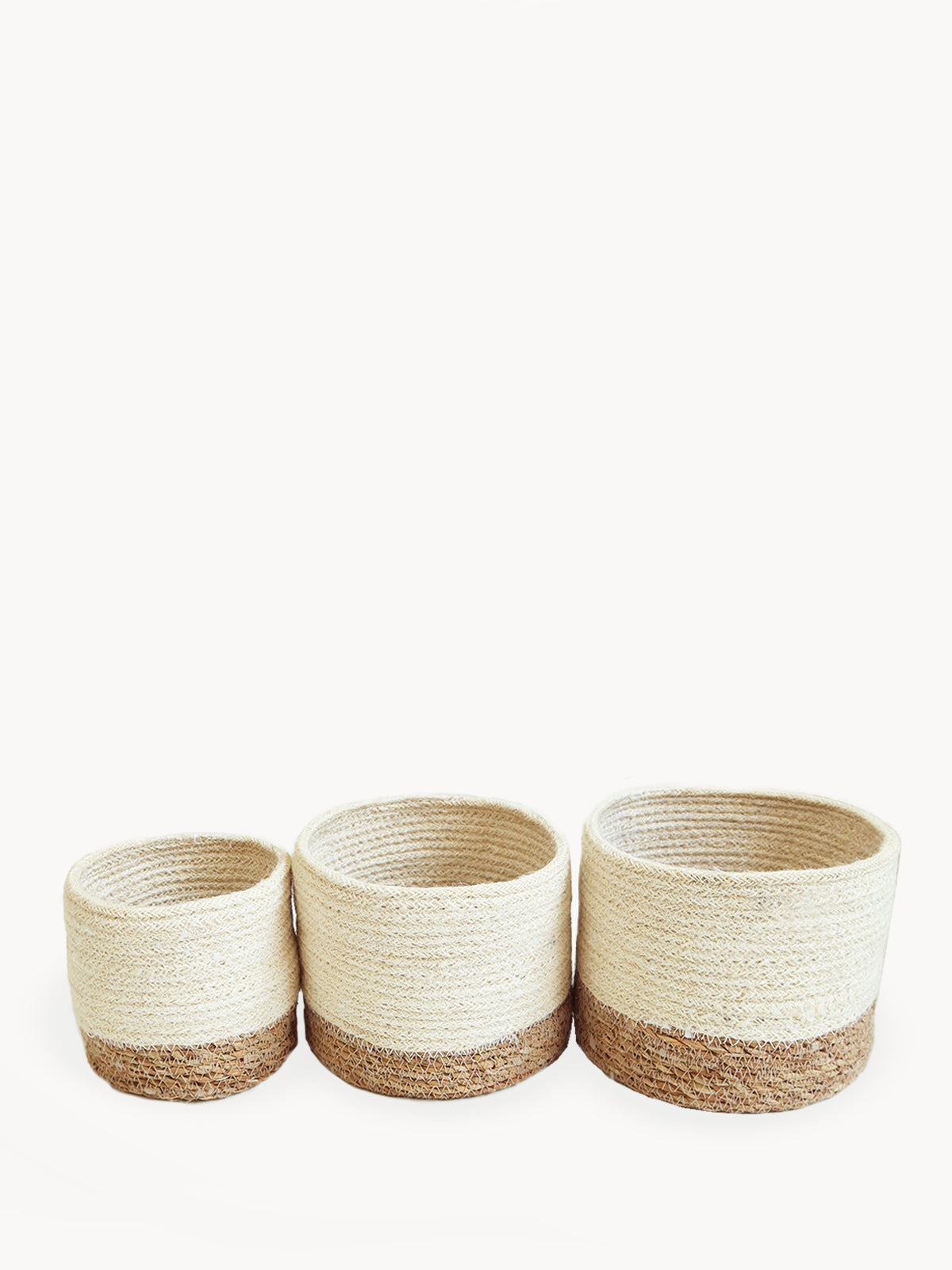 Savar Bin made from natural seagrass and jute, available in three sizes, showcasing its eco-friendly design and craftsmanship.