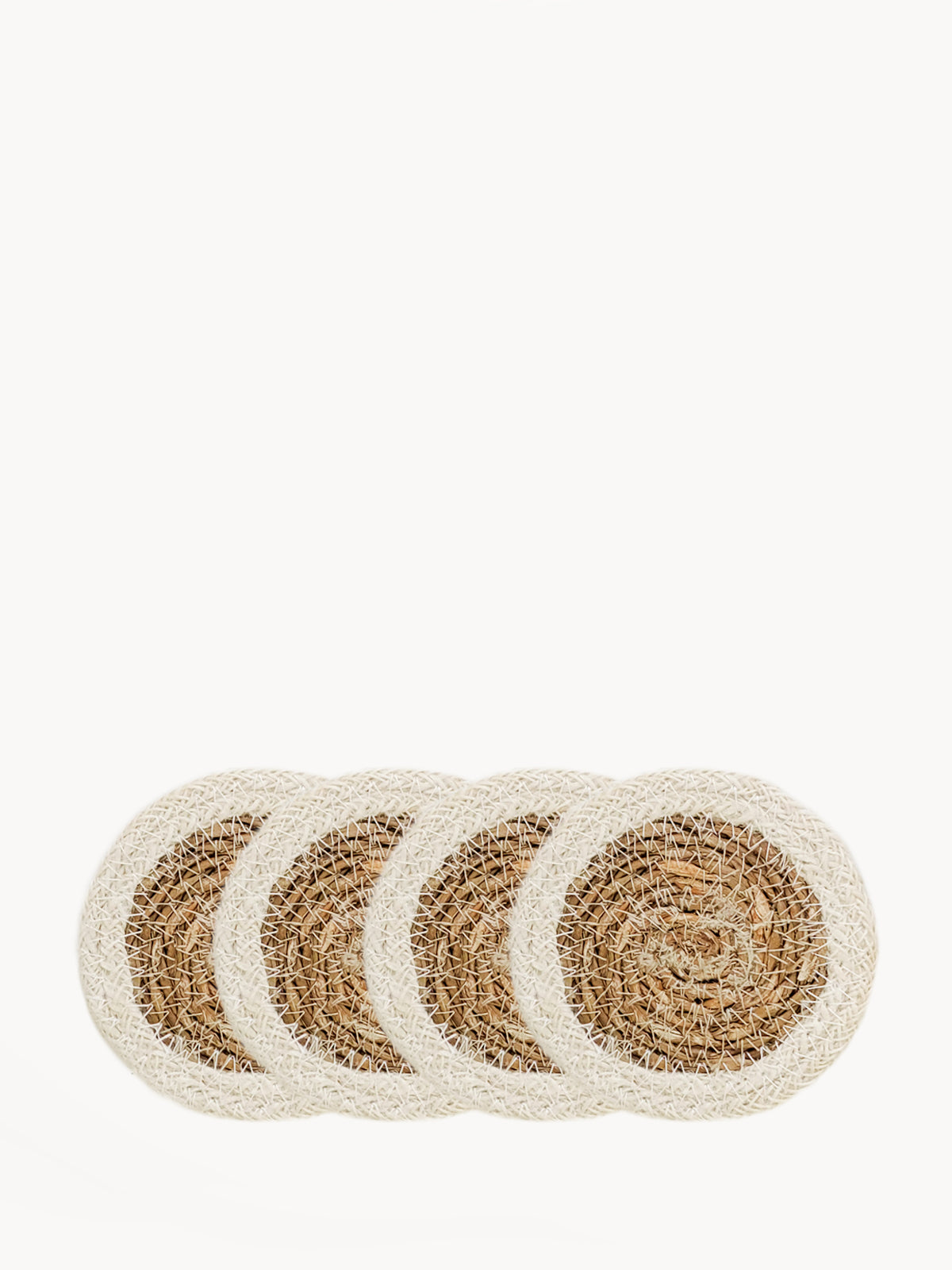 Set of 4 handmade Savar Drink Coasters made from seagrass and jute, featuring a natural and white color scheme.