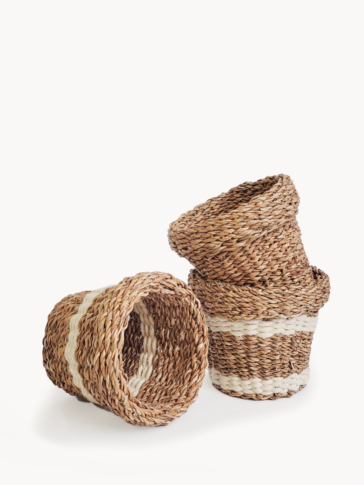 Savar Nesting Plant Basket made from sustainable seagrass, featuring a natural texture and three unique patterns, ideal for plant display.