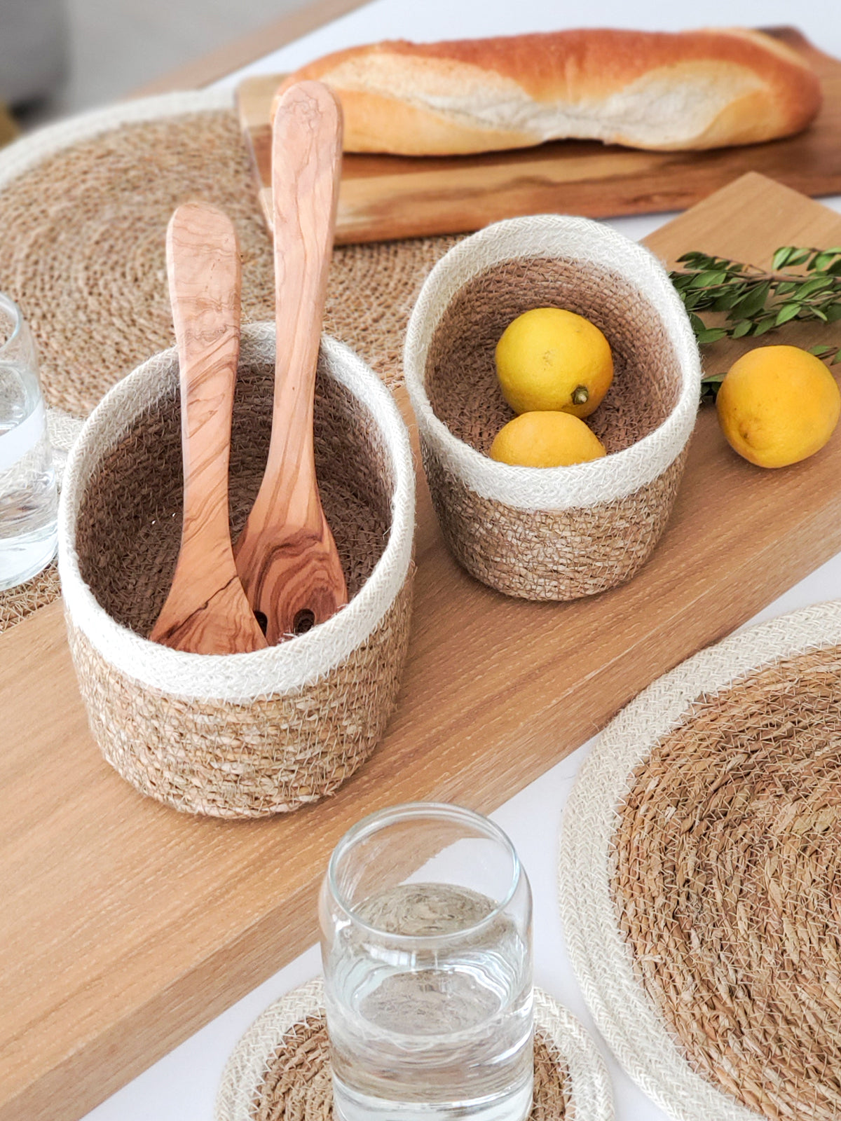 Set of 3 Savar Oval Bowls made from seagrass and jute, showcasing their natural and white colors.