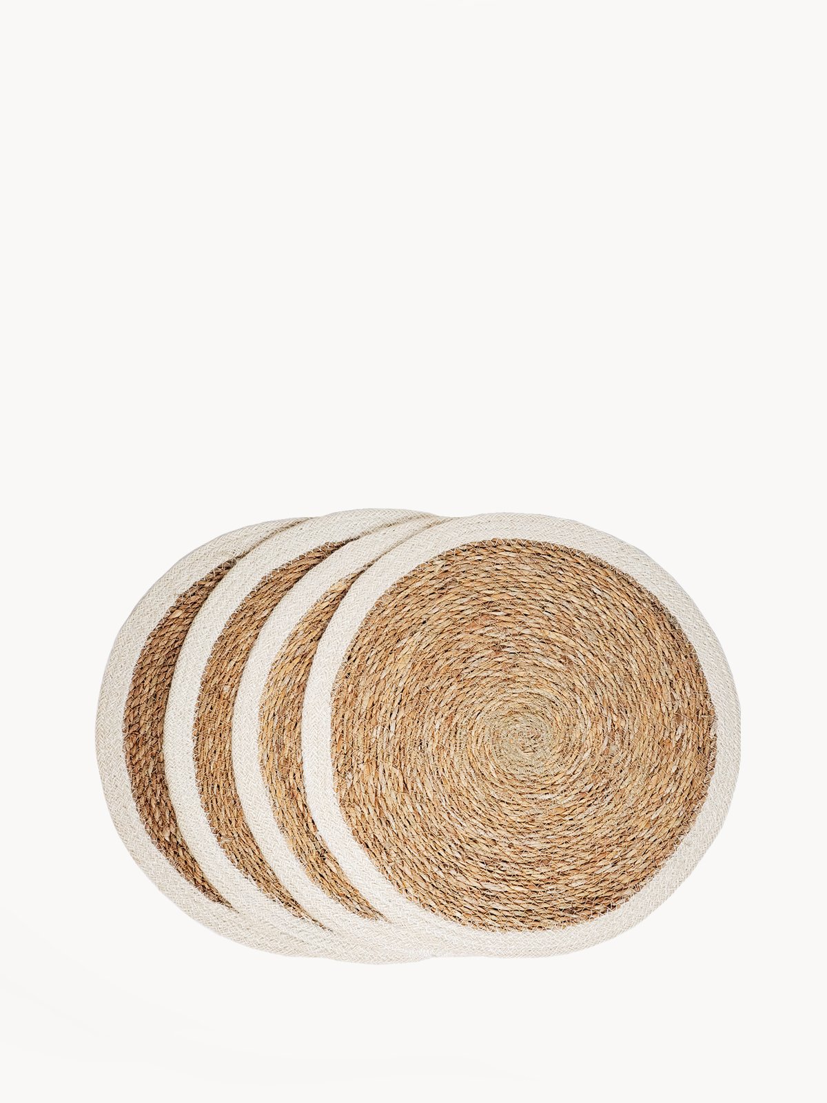 Set of 4 Savar placemats made from natural seagrass and jute, showcasing a round design with a neutral color palette.