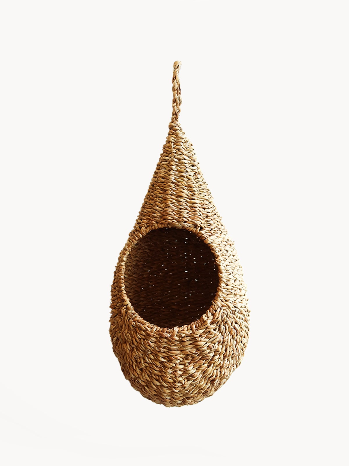 Savar Pot Planter made of natural seagrass, handwoven by artisans, showcasing its unique texture and design.