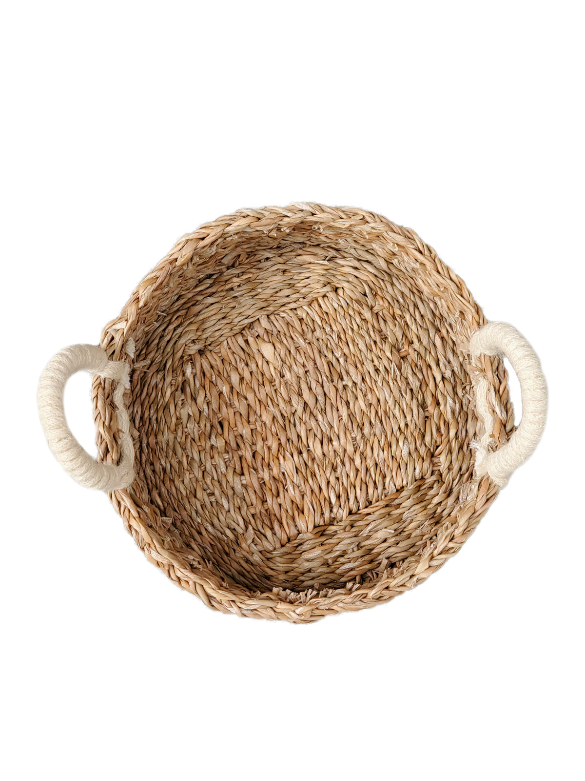 Savar Round Bread Basket made from seagrass and jute, showcasing its natural and white colors, perfect for serving bread or organizing items.