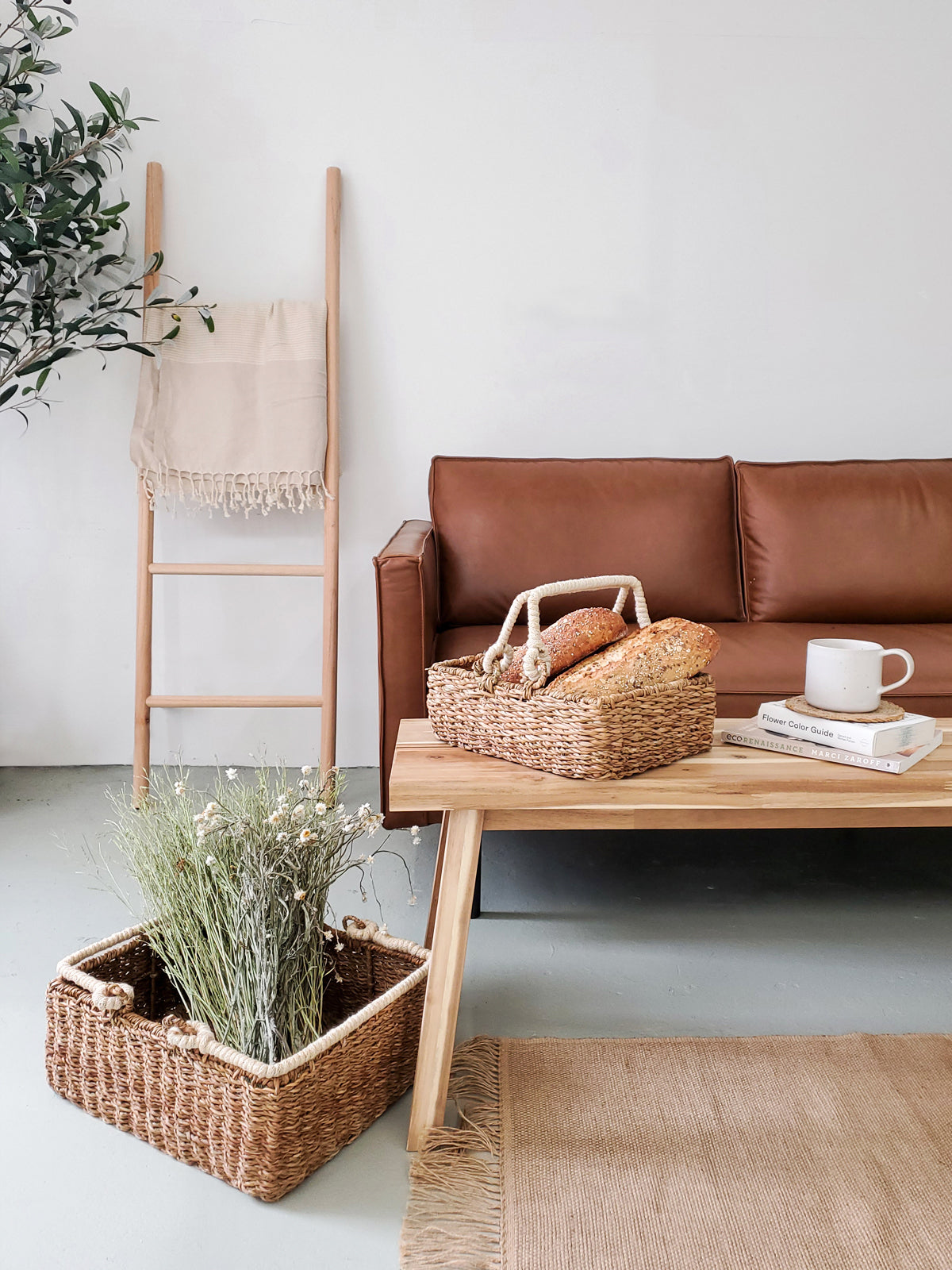 Savar Storage Basket with Handle made from natural seagrass, featuring a jute handle, perfect for home organization.