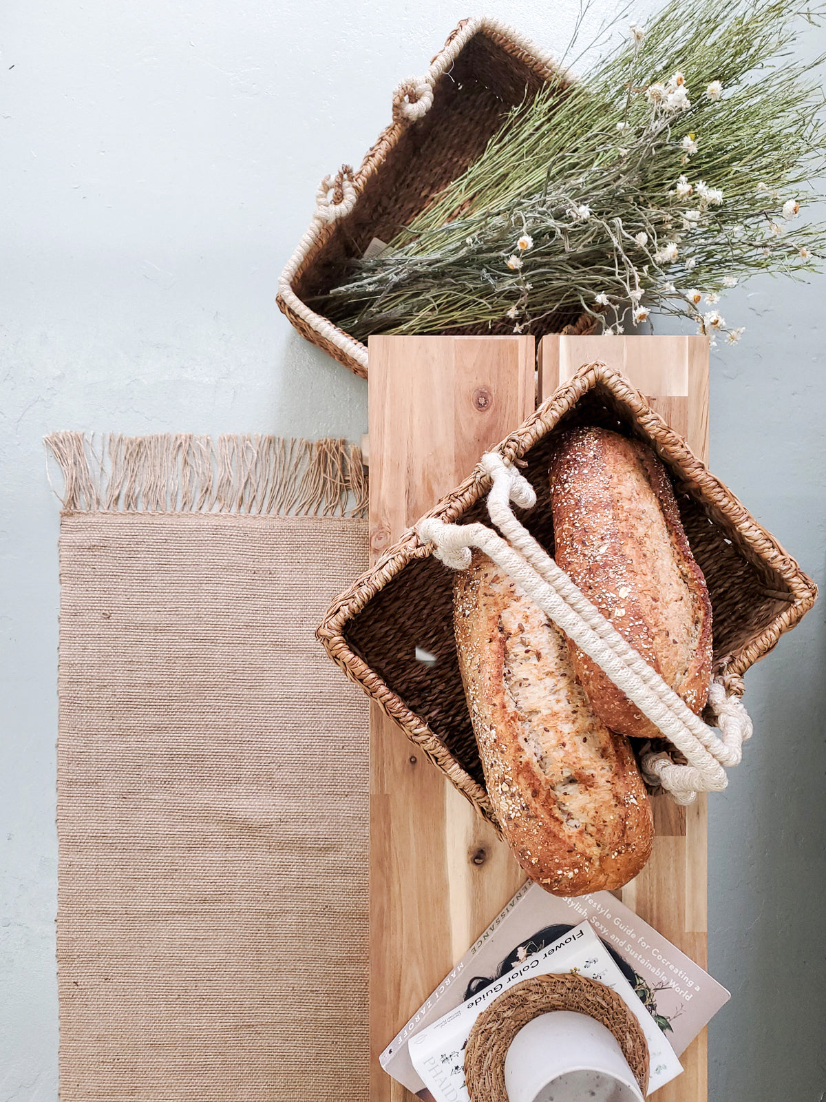 Savar Storage Basket with Handle made from natural seagrass, featuring a jute handle, perfect for home organization.