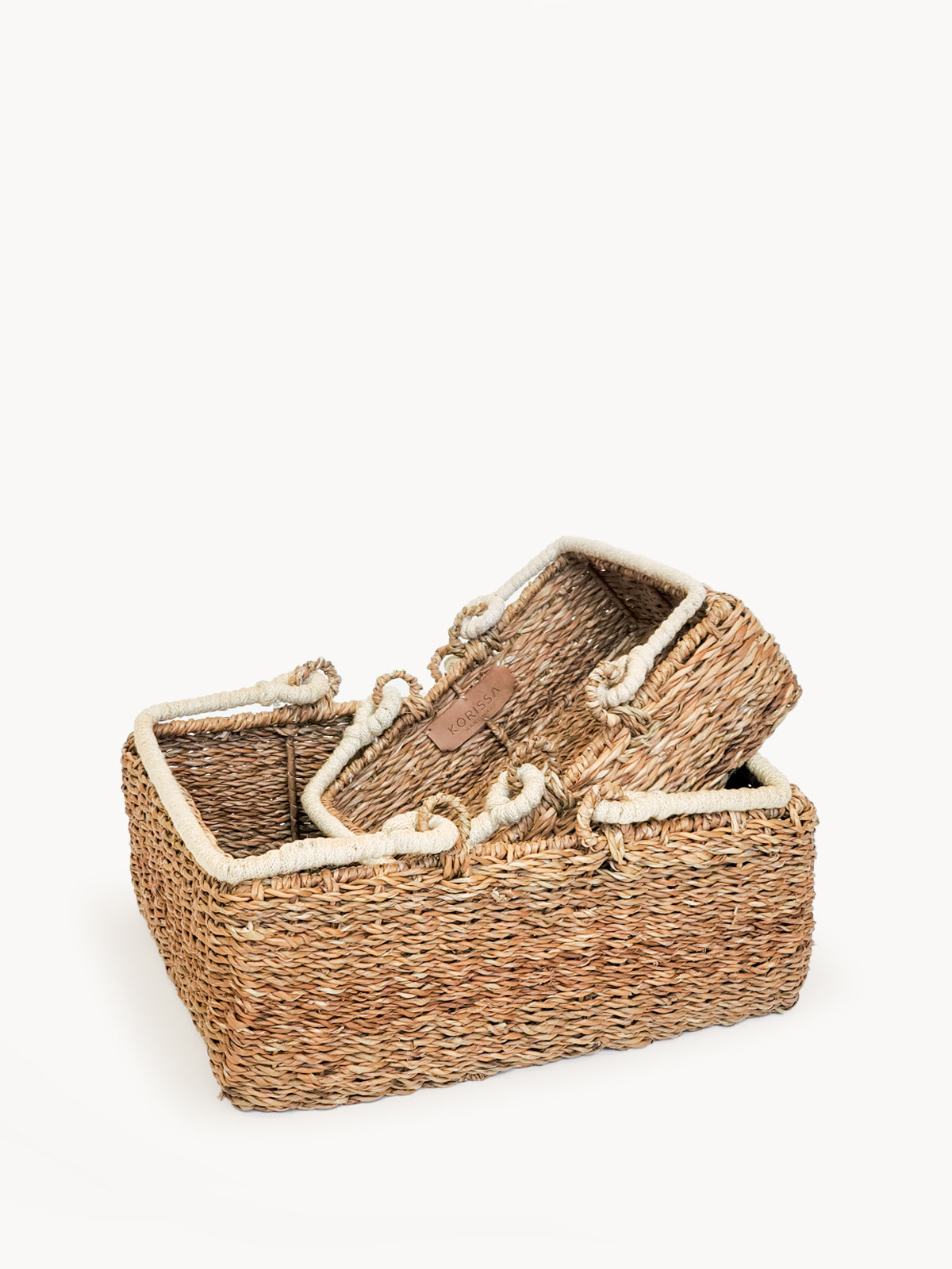 Savar Storage Basket with Handle made from natural seagrass, featuring a jute handle, perfect for home organization.